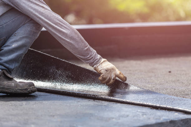 Professional Waterproofing technician working in Collins, WI